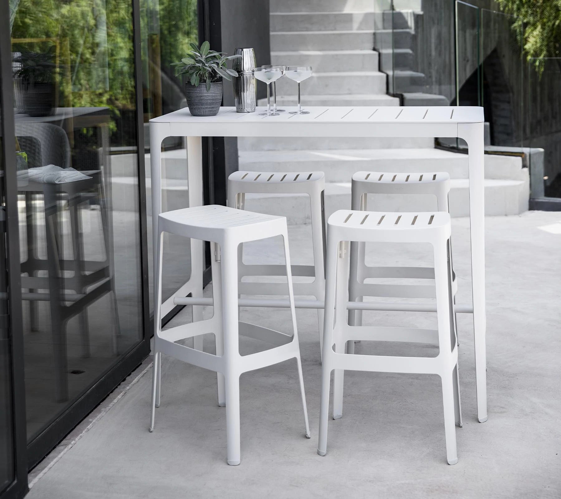 Elegant Danish-designed Laser-cut Aluminum Cane-line Bar Table