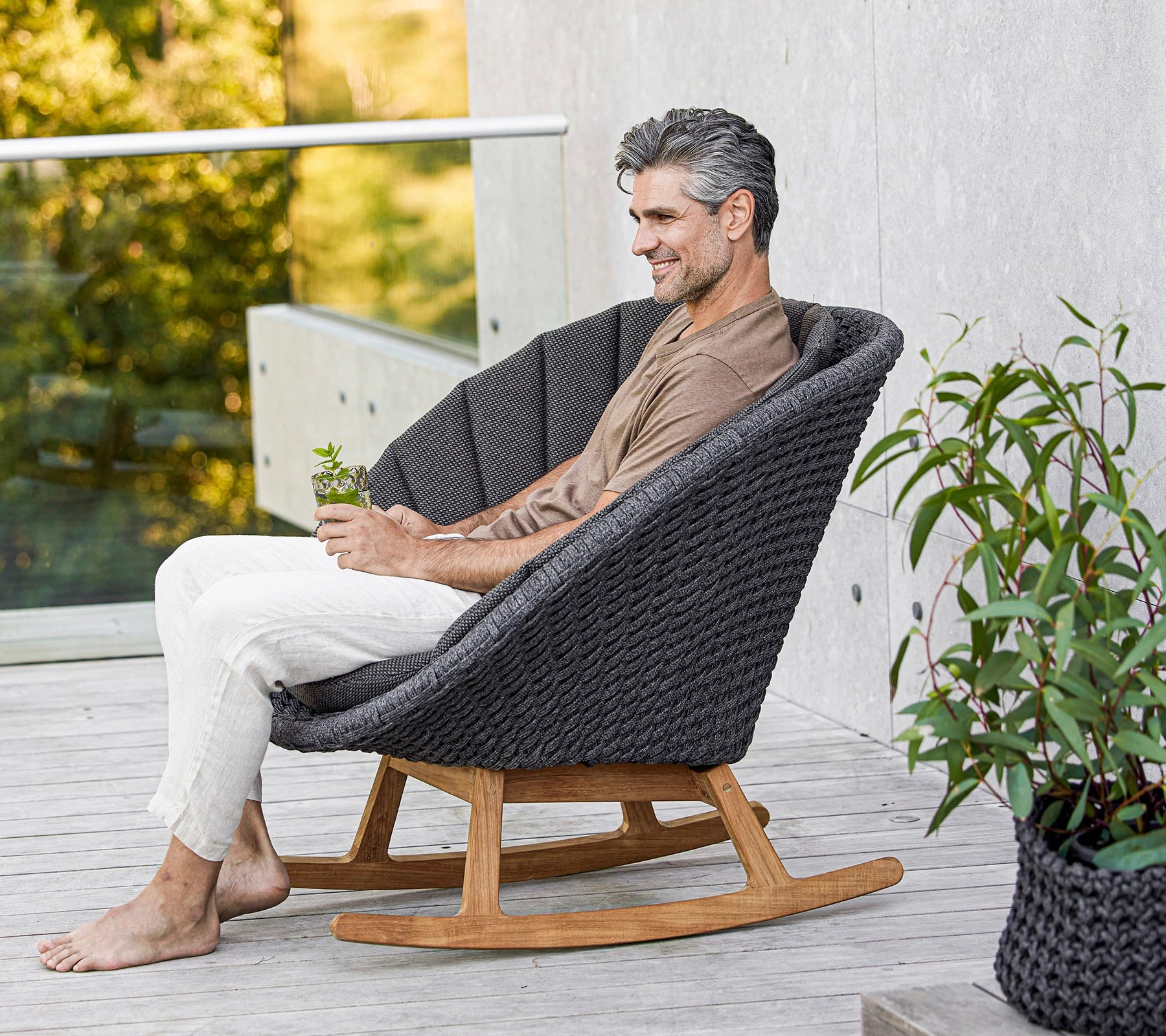 Cane-line Brand Peacock-Style Outdoor Rocking Chair for Relaxation