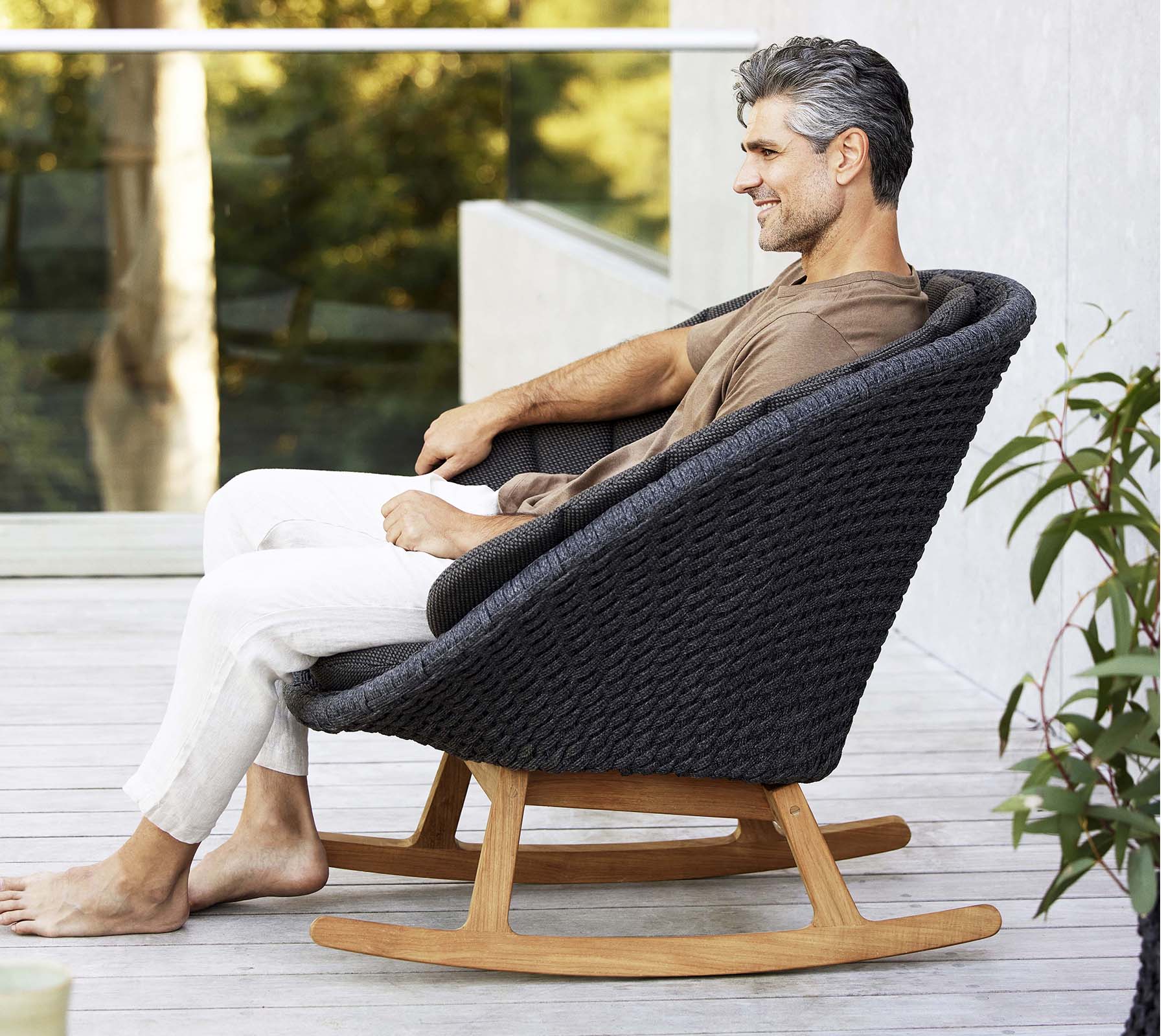 Cane-line Brand Peacock-Style Outdoor Rocking Chair for Relaxation