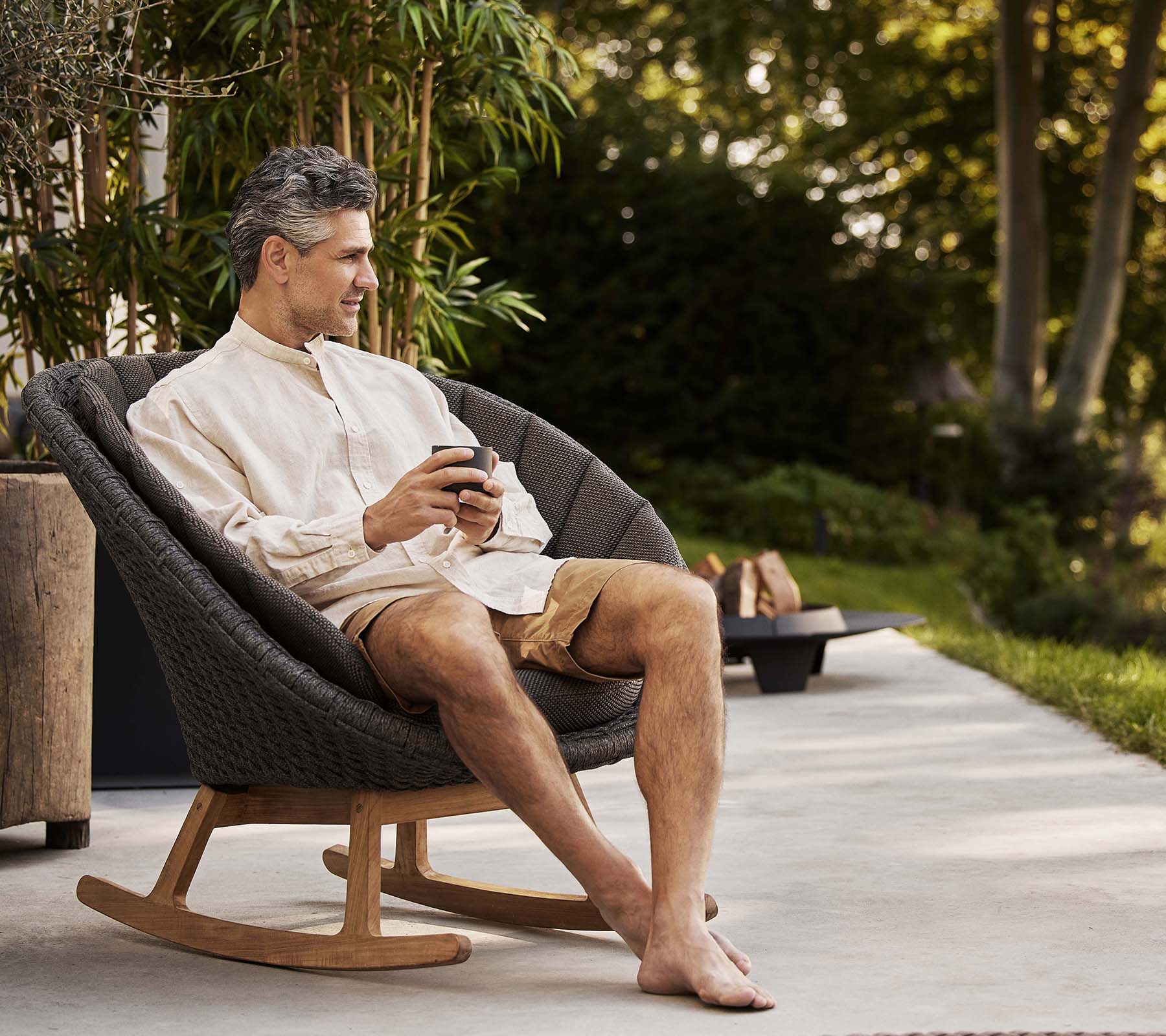 Cane-line Brand Peacock-Style Outdoor Rocking Chair for Relaxation