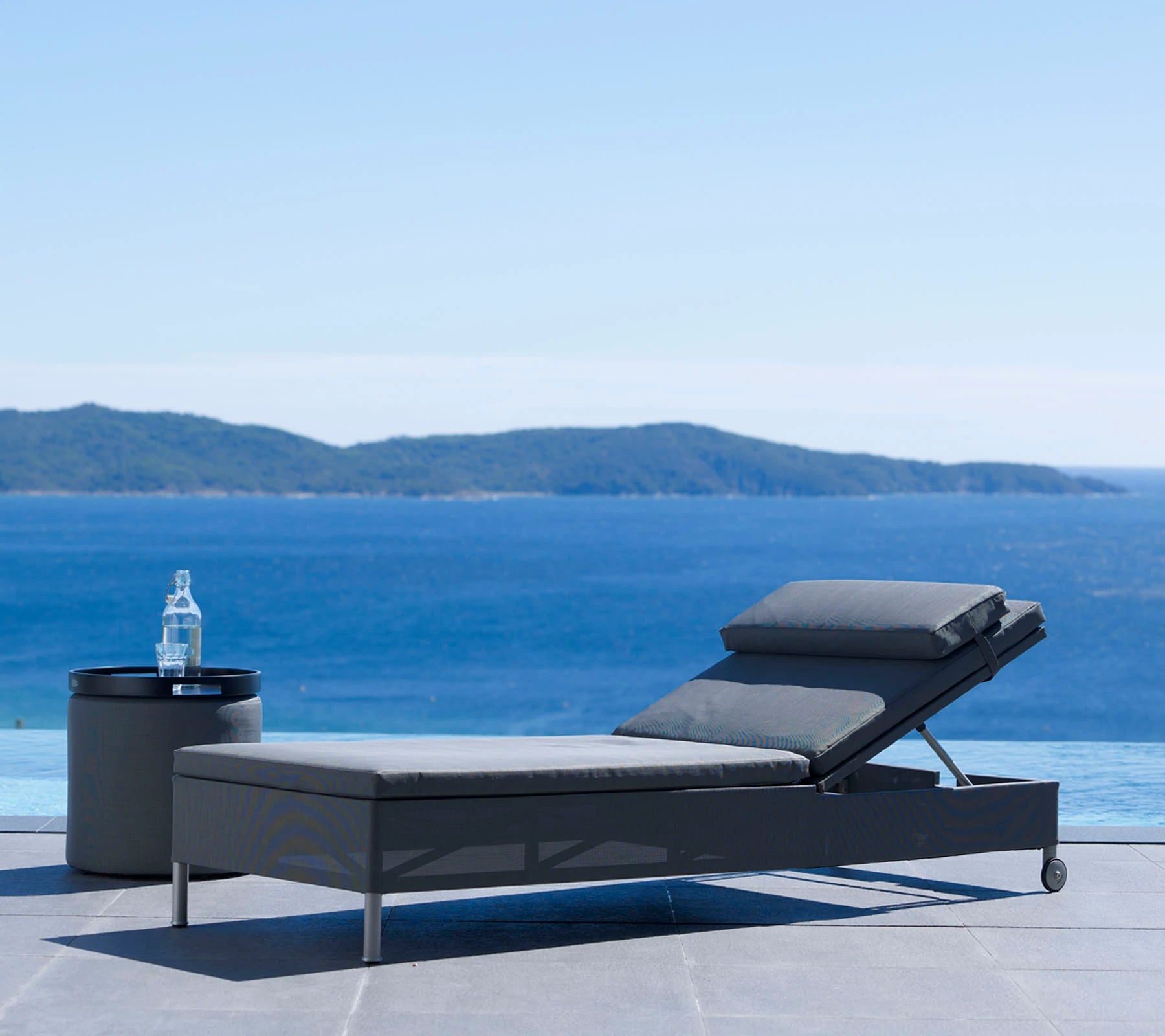 Cane-line Rest Multi-functional Side Table and Footstool with Quick - Dry Feature