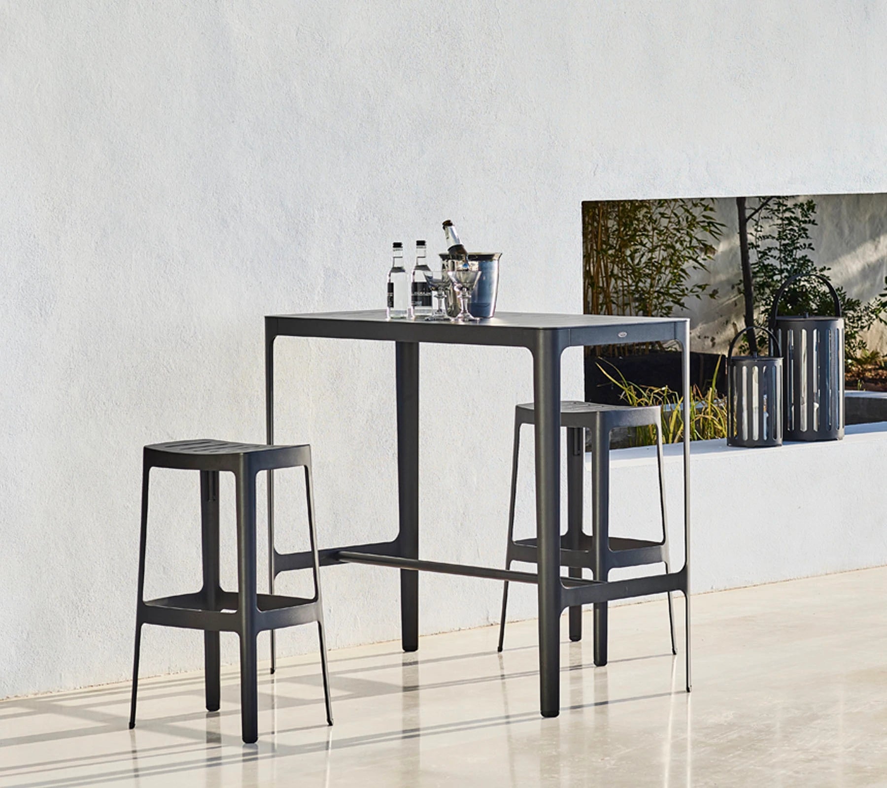 Elegant Danish-designed Laser-cut Aluminum Cane-line Bar Table