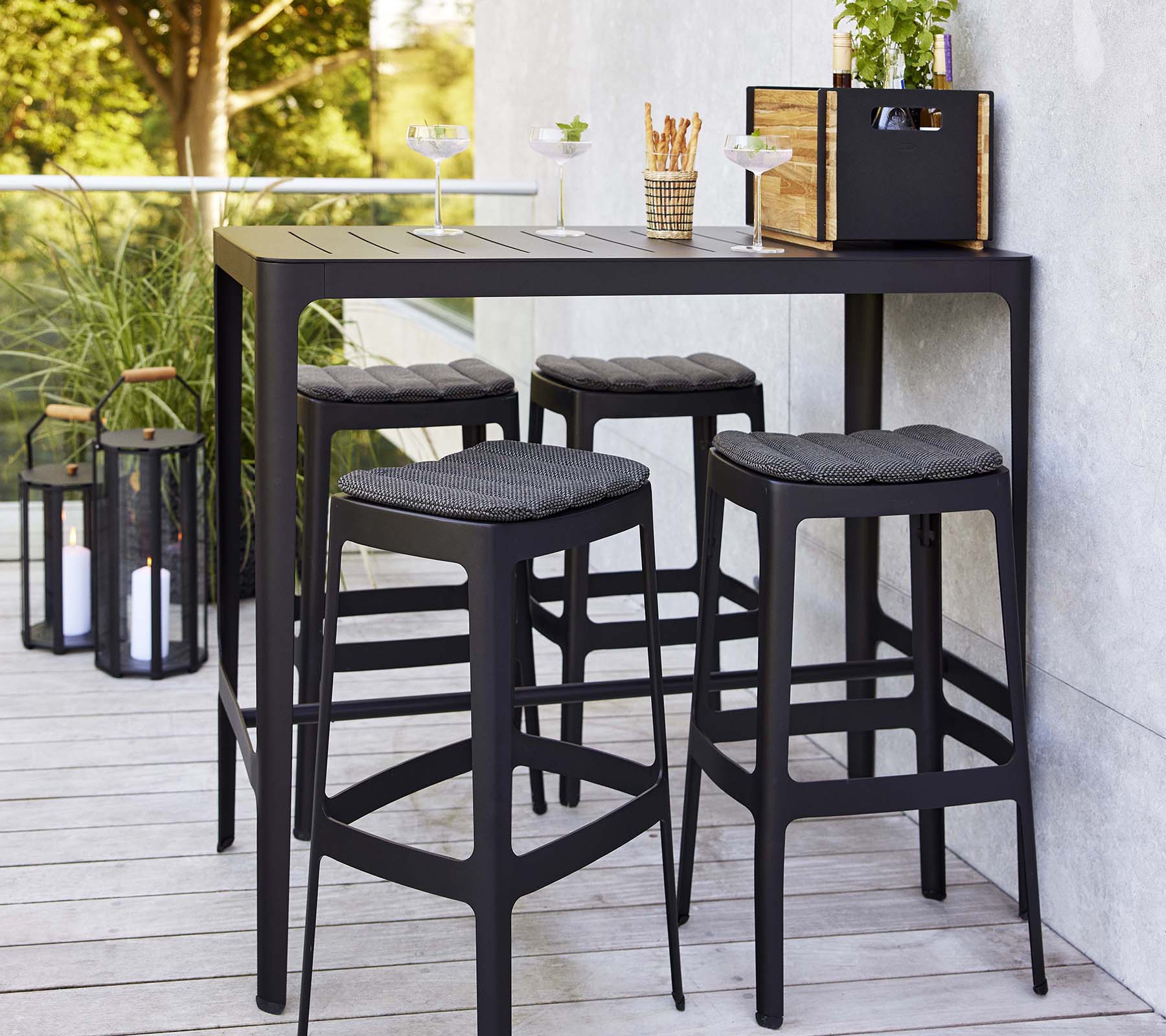 Elegant Danish-designed Laser-cut Aluminum Cane-line Bar Table