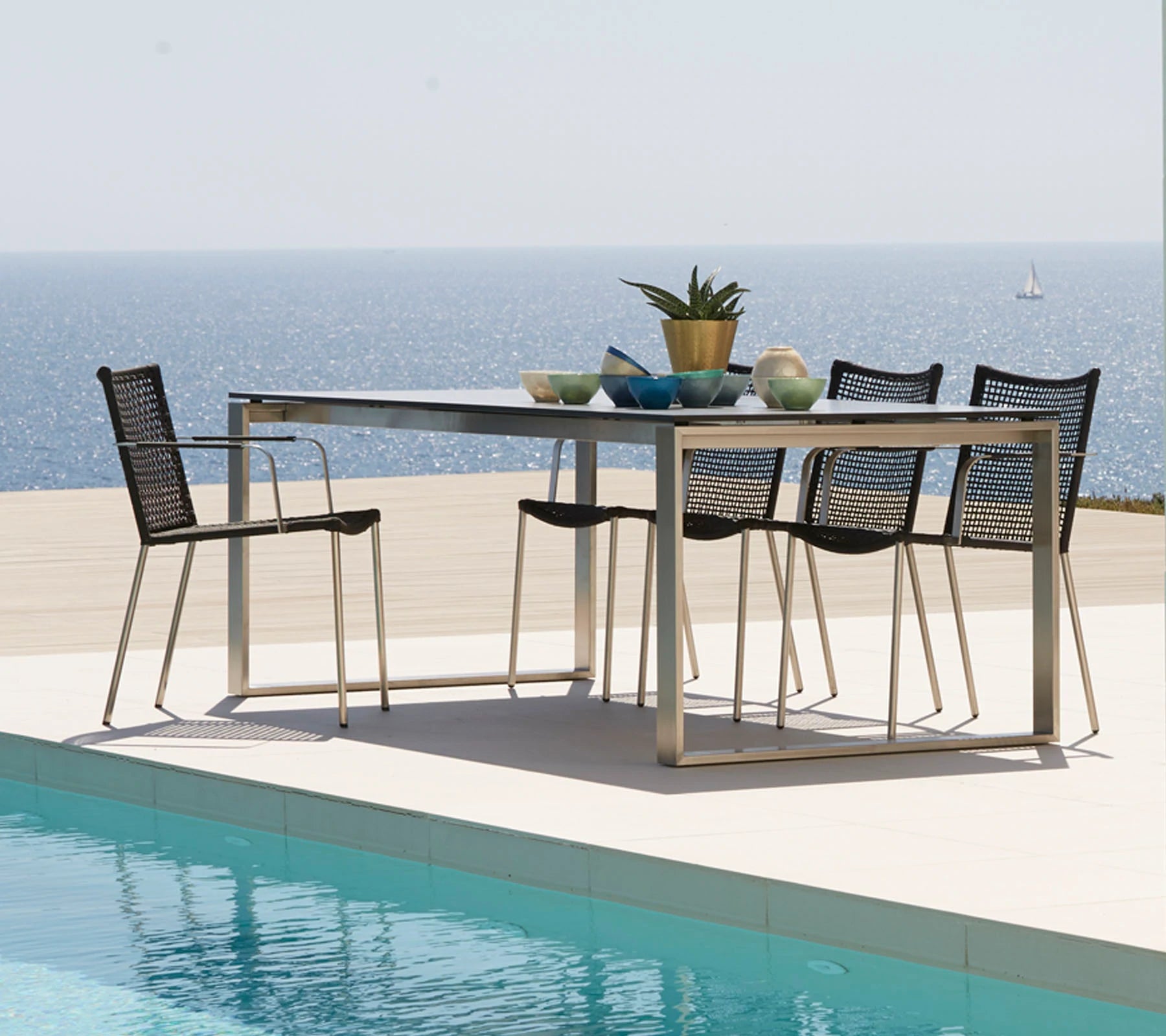 Stackable Cane-line Straw Armchair with Modern Design