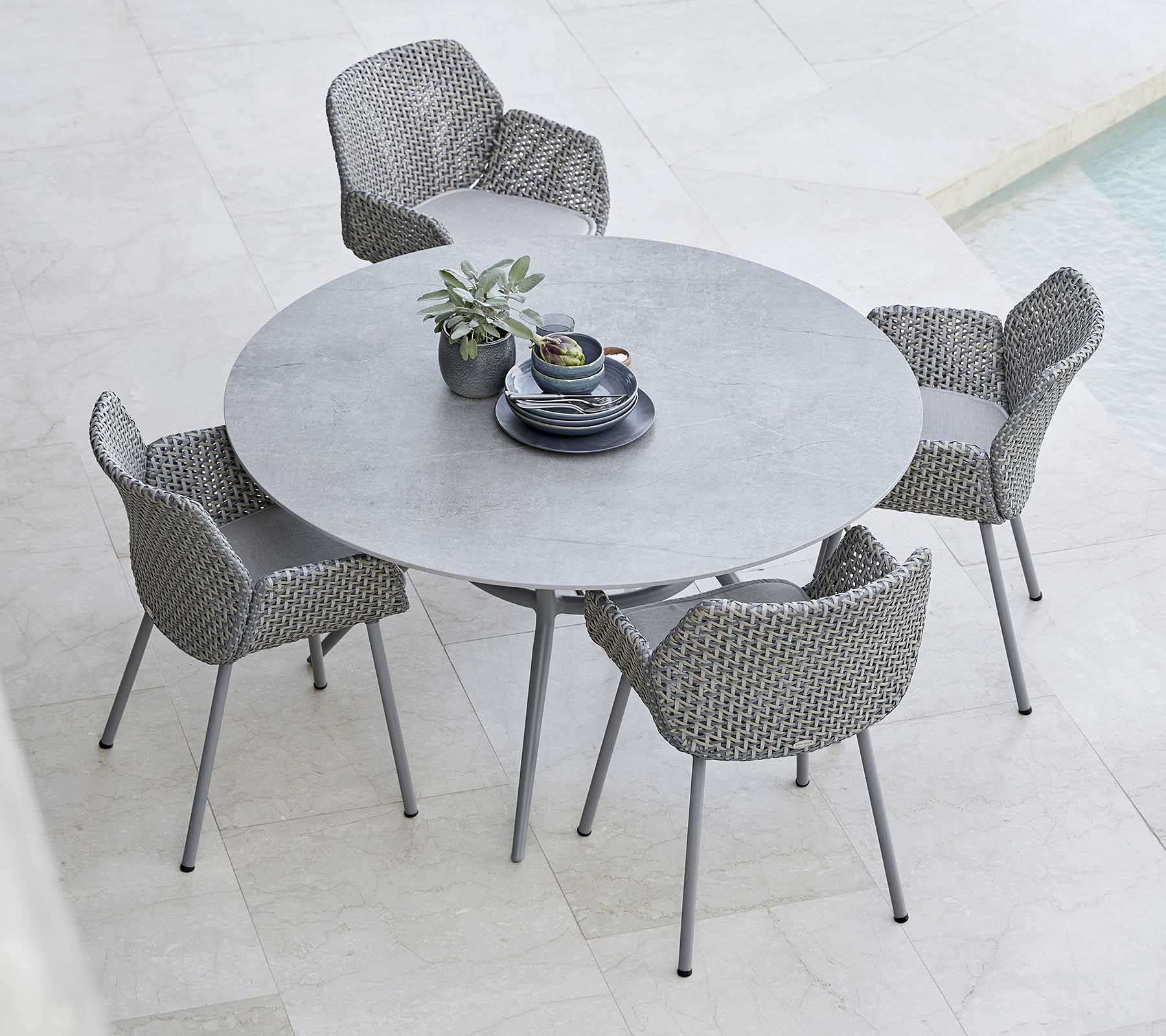 Cane-line Elegant Round Joy Dining Table with Aluminum Base