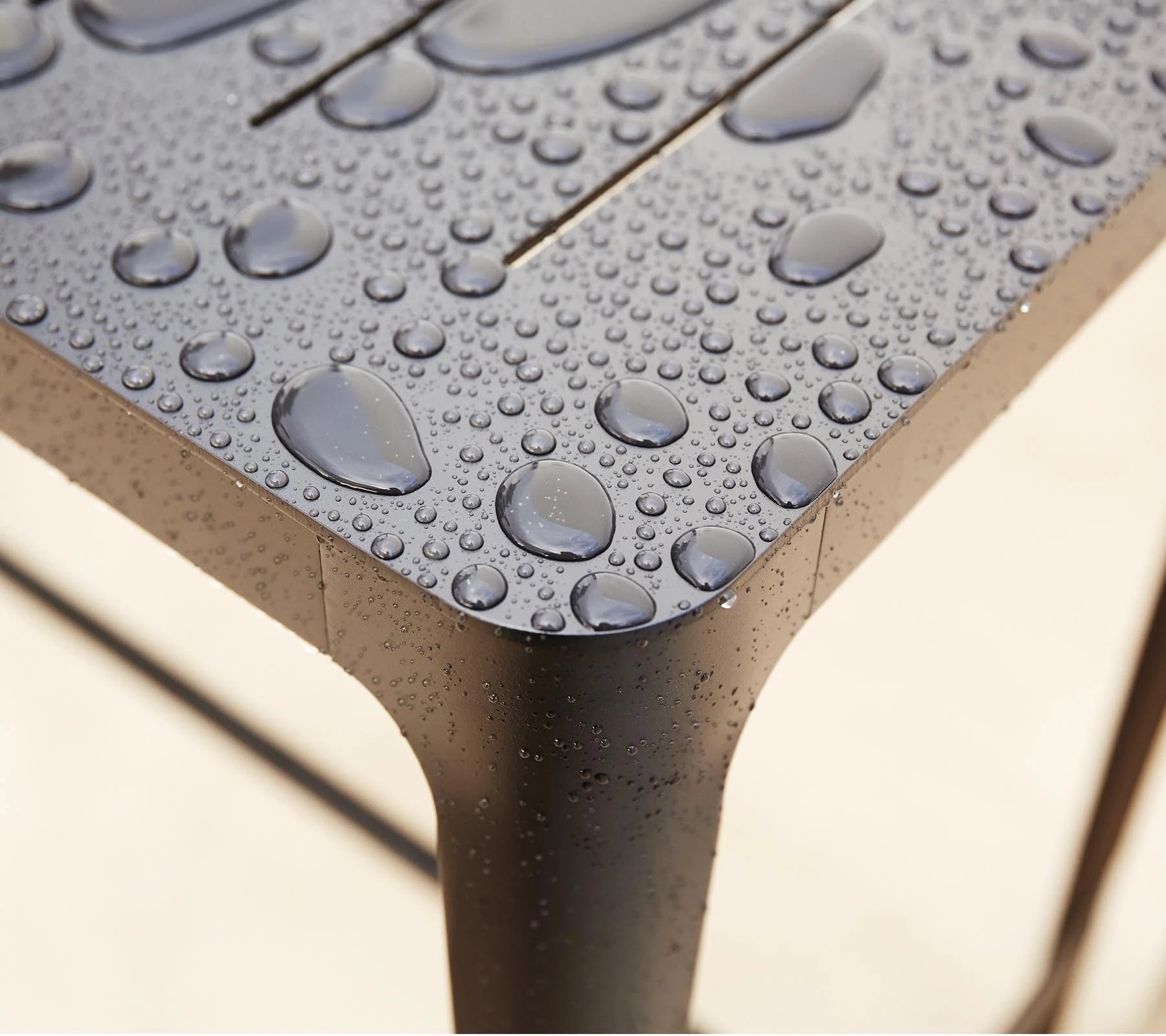 Elegant Danish-designed Laser-cut Aluminum Cane-line Bar Table