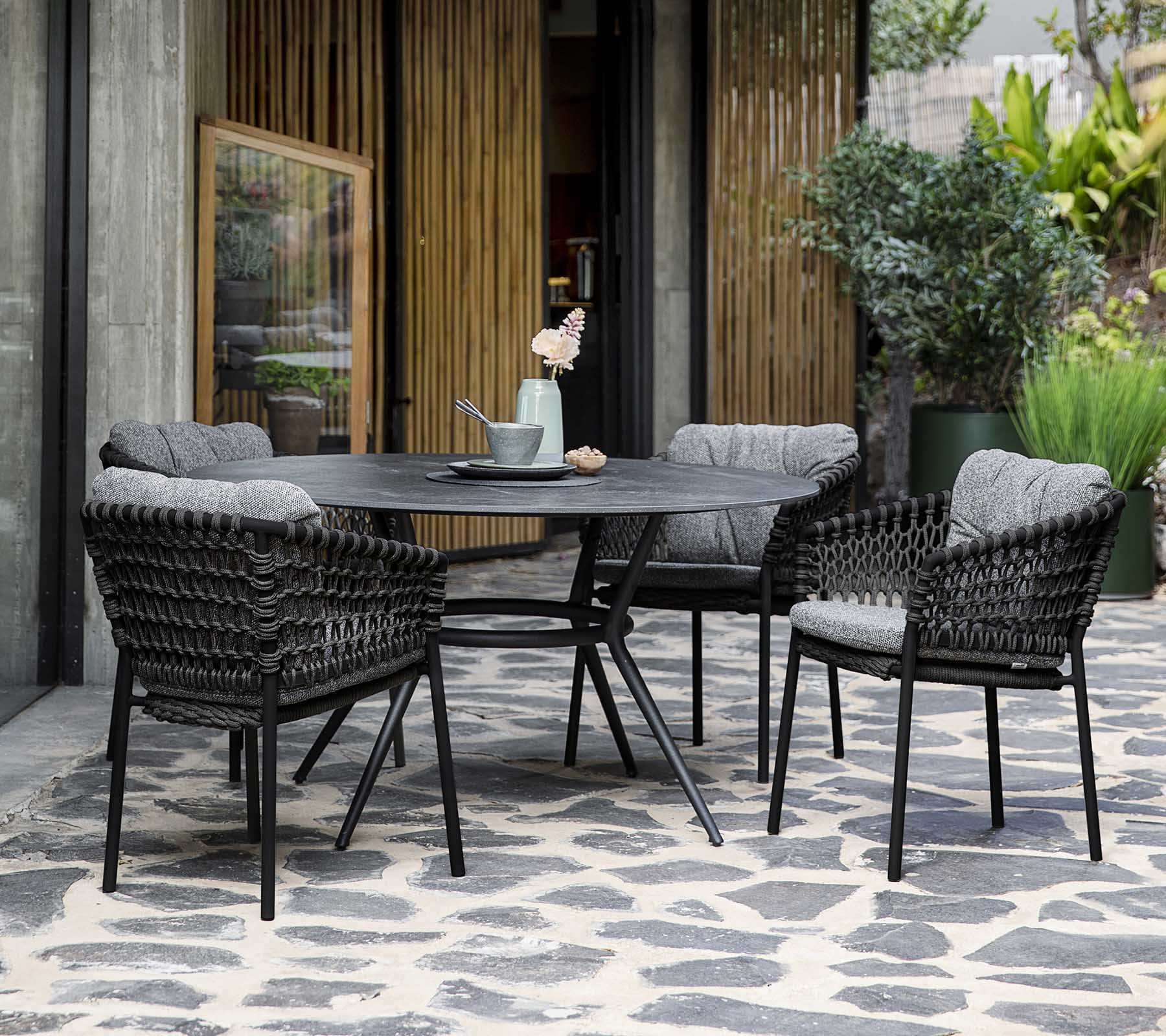 Cane-line Elegant Round Joy Dining Table with Aluminum Base